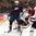 TORONTO, CANADA - December 26: USAâ€™s Jordan Greenway #12 fends off Latvia's Rudolfs Balcers #21 during preliminary round action at the 2017 IIHF World Junior Championship. (Photo by Matt Zambonin/HHOF-IIHF Images)

